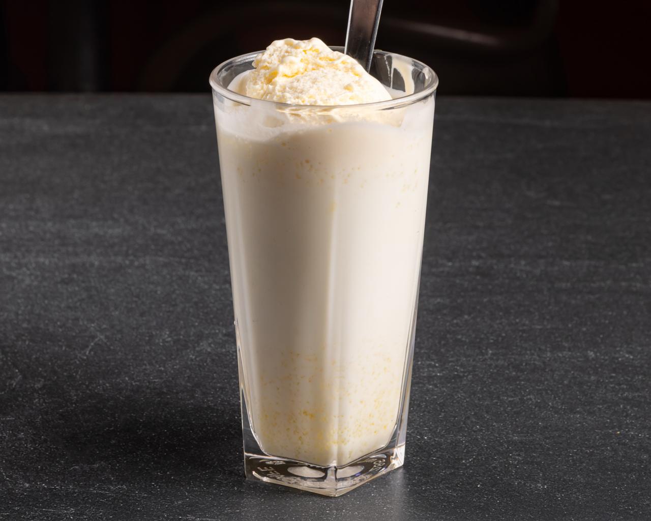 A glass of Madurai Jigarthanda topped with ice cream